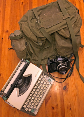 Camera and Typewriter and Army bag